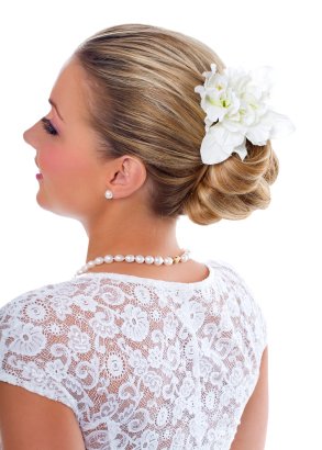Sleek Low Chignon with Flowers