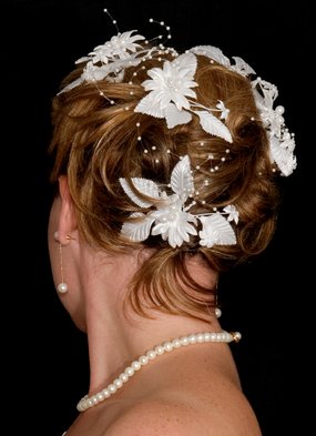 Elaborate Updo with White Accessories